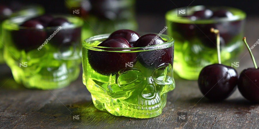 A Collection Of Cherry Jello Shots Each Garnished With A Whole Cherry And Toothpick Arranged On A Dark Surface — Stock Photo
