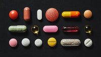 A Collection Of Colorful Pills Displayed In A Neat Row Against A Dark Background — Stock Photo