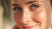 a woman with blue eyes is captured in a close up portrait showcasing her striking gaze and fair skin - Stock Video
