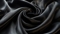 Showcases A Close Up View Of A Black Fabric With A Swirling Pattern Which To Be A Piece Of Clothing Material — Stock Photo