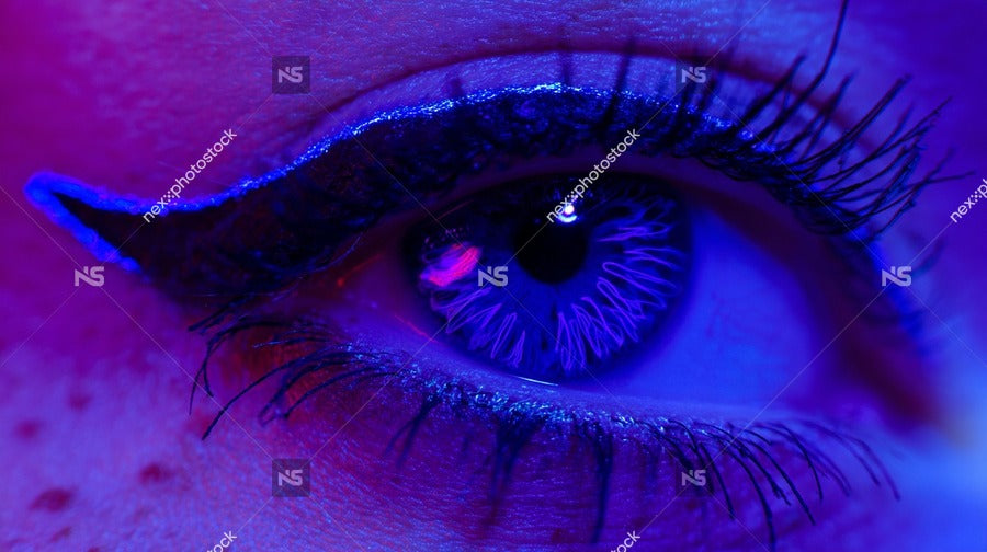 A Close Up Image Of A Human Eye With Blue Makeup Showcasing The Intricate Details And Vibrant Color — Stock Photo