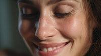 captures a close up of a woman s face showcasing her emotional expression as she gazes off to the side with a slight smile - Stock Video