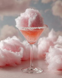 Pink Cotton Candy Cocktail On A White Surface With Pink Fluffy Clouds In The Background — Stock Photo