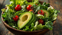 A Bowl Of Fresh Avocado Salad With Cherry Tomatoes And Lettuce On A Wooden Table — Stock Photo