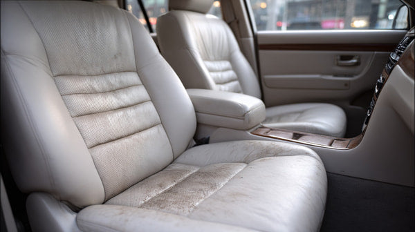 Dirty Car Interior With Visible Dirt And Stains On Leather Seats Door Panels And Console — Stock Photo