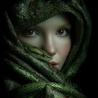 A Woman With A Snake Wrapped Around Her Neck Wearing A Green Hooded Cloak And Looking Directly Into The Camera — Stock Photo