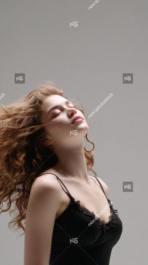 A Woman With Long Hair Is Captured In A Portrait Where Her Hair Is Caught Mid Motion As It Blows In The Wind — Stock Photo