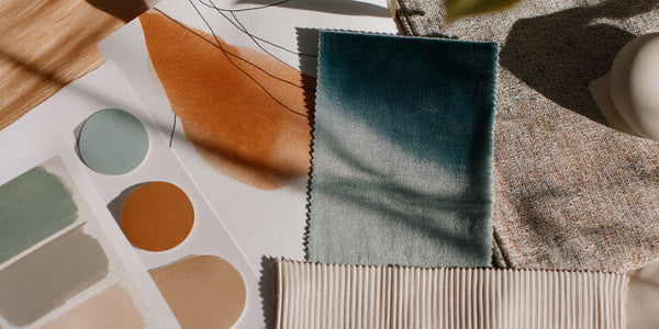Fabric Swatches Displayed On A Table Showcasing Various Colors And Textures Of Fabric Samples — Stock Photo