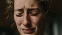 A Close Up Portrait Of A Person With Their Eyes Closed And Tears Streaming Down Their Face — Stock Photo
