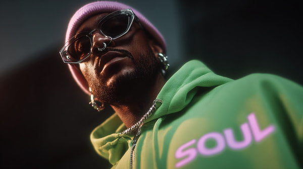 A Portrait Style Photograph A Person Wearing Sunglasses And A Colorful Hoodie With The Word Soul Visible On It — Stock Photo