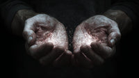 A Pair Of Hands Gently Cradling A Small Amount Of Ash Set Against A Dark Background — Stock Photo
