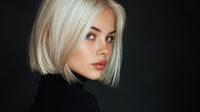 Woman With Short Blonde Hair And Blue Eyes In A Black And White Portrait — Stock Photo