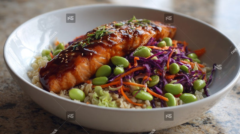 A Bowl Of Asian Inspired Food Including Fish And Vegetables Served On A Dining Table — Stock Photo