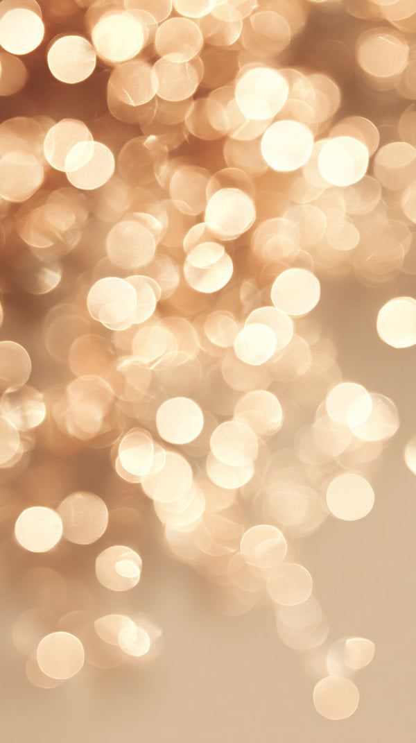 Blurred Bokeh Background With Golden Confetti Like Particles In Focus Creating A Soft Warm Glow Effect — Stock Photo