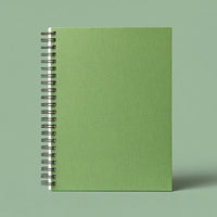 Spiral Bound Notebook With A Light Green Cover And Black Spiral Binding Placed Against A White Background — Stock Photo