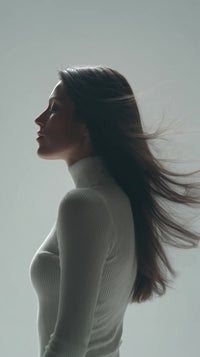 a woman with long hair is captured in motion creating a dynamic and image - Stock Video