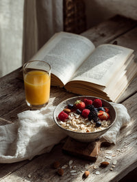 A Cozy Breakfast Scene With A Bowl Of Oatmeal Fresh Fruit And A Glass Of Orange Juice On A Wooden Table — Stock Photo