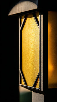 A Black And Yellow Lantern With A Rectangular Shape A Glass Pane In The Center Set Against A Dark Background — Stock Photo