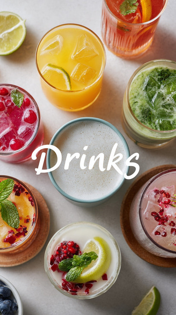 A Variety Of Colorful Drinks Displayed In A Row With Limes And Mint Leaves Garnishing Some Of Them — Stock Photo