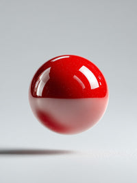A Red Ball Is Placed On A White Surface — Stock Photo