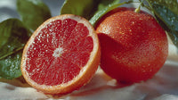 A Close Up Image Of A Grapefruit With Seeds Showcasing Its Vibrant Color And Texture — Stock Photo