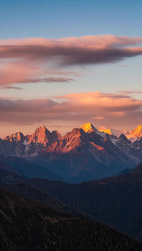 awe inspiring mountain range at sunrise with majestic peaks and a breathtaking view of the sky - Stock Video