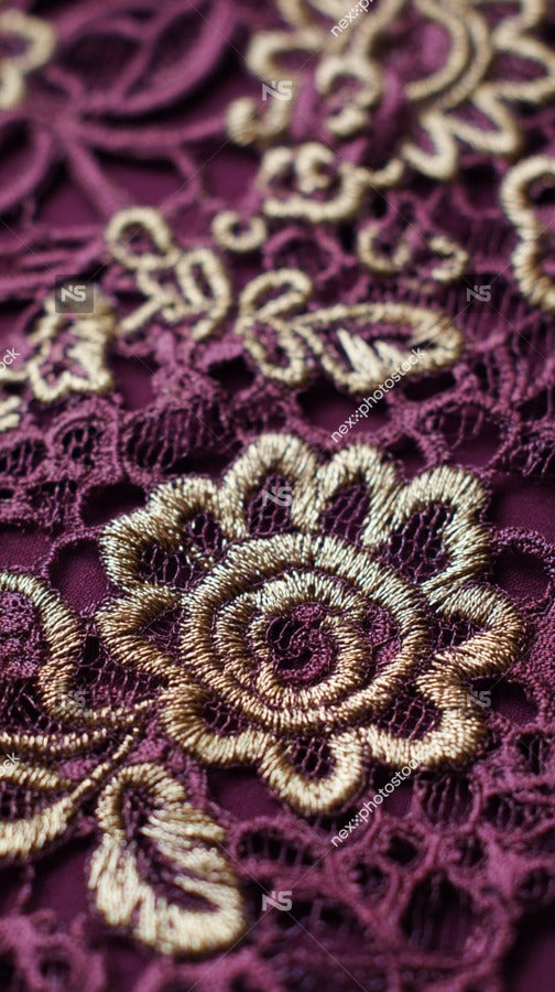 A Close Up Of A Purple Lace Fabric Adorned With Gold Embroidery Showcasing Intricate Patterns And Designs — Stock Photo