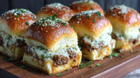 Cheesy Meatball Sliders On A Wooden Board Topped With Parmesan Cheese And Garnished With Fresh Herbs — Stock Photo