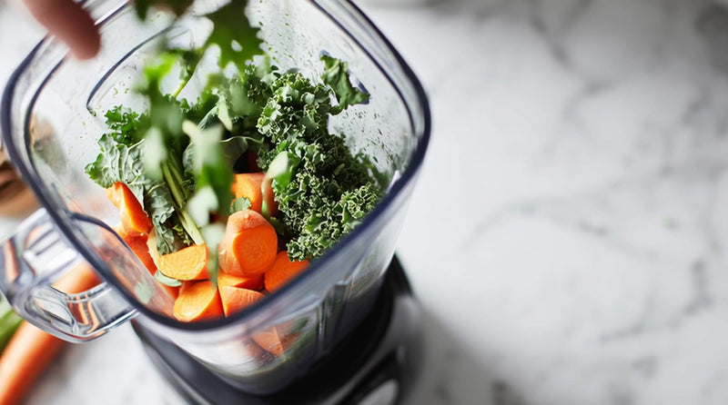 fresh vegetables in a blender - Stock Video