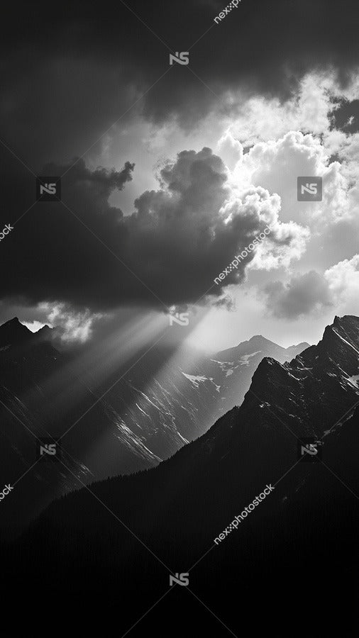 Dark And Moody Mountain Landscape With Sunlight Filtering Through Clouds Creating A Silhouette Effect On The Peaks — Stock Photo