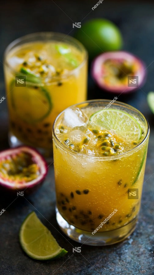 A Refreshing Tropical Drink Garnished With Lime And Pomegranate Seeds Served In A Glass On A Table — Stock Photo