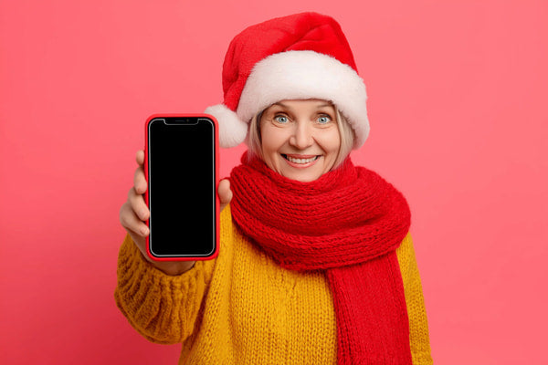 A Woman In A Red And White Striped Scarf Is Holding Up A Smartphone With A Black Case — Stock Photo