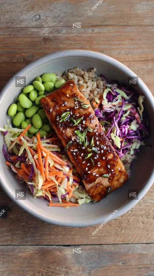 A Meal Of Salmon Rice Vegetables And Sauce Served In A Bowl On A Table — Stock Photo
