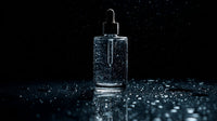 Shows A Bottle Of Perfume With A Dropper On A Surface That To Be Reflecting Light Due To Its Glossy Nature — Stock Photo