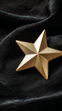A Golden Star On A Black Background — Stock Photo