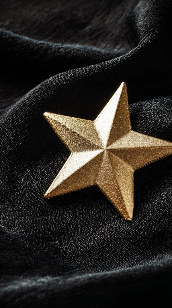 A Golden Star On A Black Background — Stock Photo