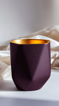 A Purple Vase With A Gold Interior On A Table — Stock Photo
