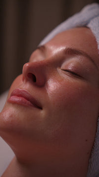 A Close Up Portrait Of A Woman With Her Eyes Closed Seemingly In A State Of Relaxation Sleep — Stock Photo