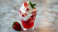 A Glass Dish Filled With Strawberry Shortcake And Whipped Cream Placed On A Table — Stock Photo