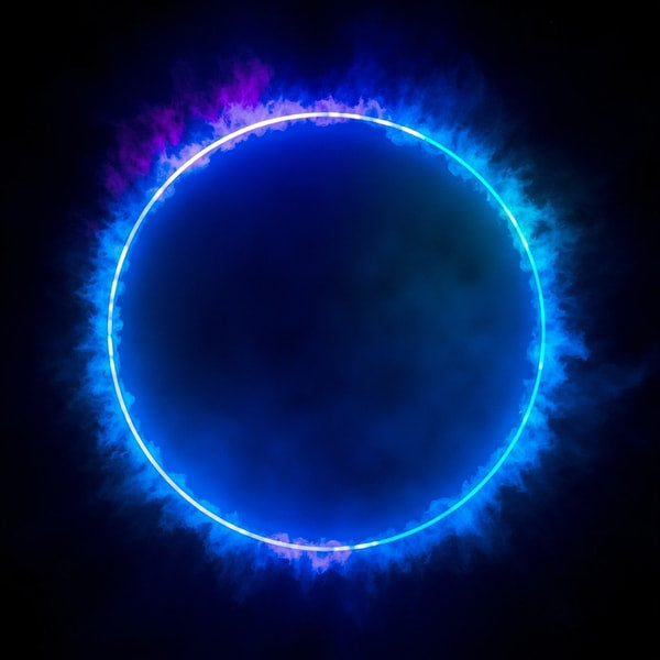A Glowing Blue Halo With A Dark Center Emitting From An Unseen Source Set Against A Black Background — Stock Photo