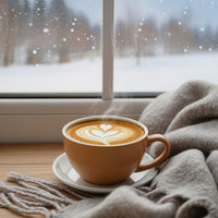 A Cozy Winter Scene With A Cup Of Coffee And A Blanket On A Table By A Window — Stock Photo