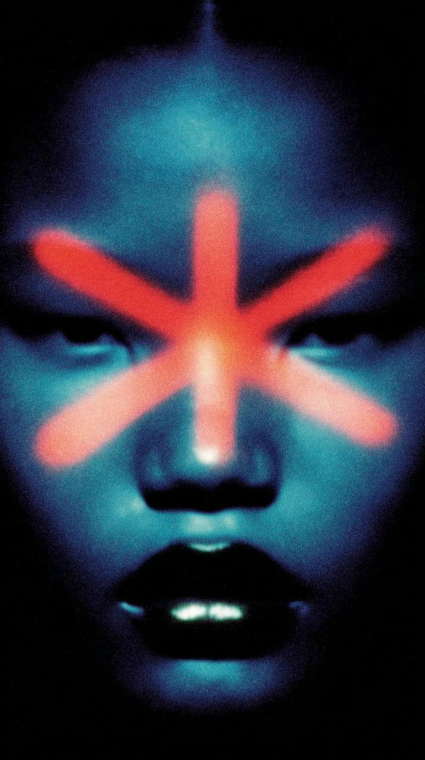 A Portrait Of A Person With Red And Blue Lighting Showcasing Their Face In Close Up — Stock Photo