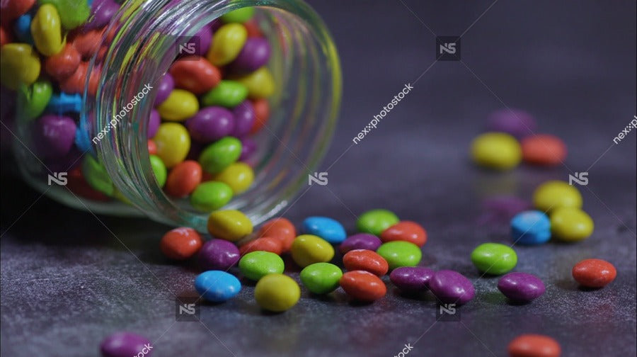 Presents A Close Up View Of A Clear Glass Jar Filled With Colorful M M Candies — Stock Photo