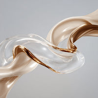 Two Images Of A Shiny Metallic Looking Liquid In Motion Creating A Wavy Pattern Against A White Background — Stock Photo