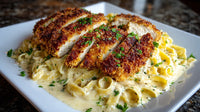 A Plate Of Breaded Chicken And Pasta Served On A White Plate Placed On A Table — Stock Photo