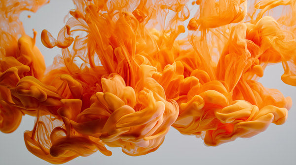Orange Ink Splashing In Mid Air — Stock Photo