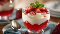 Strawberry Shortcake Dessert With Whipped Cream And Berries Served In A Glass Dish On A Table — Stock Photo