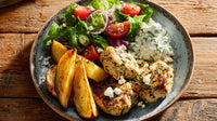 A Plate Of Grilled Chicken Potatoes Salad And Tzatziki Sauce On A Wooden Table — Stock Photo