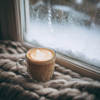A Cup Of Coffee Sits On A Windowsill Overlooking A Snowy Landscape — Stock Photo