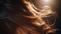 Wavy Brown Hair Captured In Motion With A Close Up View Of The Strands Set Against A Blurred Background — Stock Photo